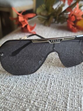 Prada Men's Black Shield Sunglasses with Gold Trim